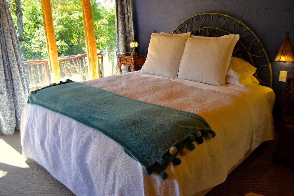 Tree Lodge Nidos De Pucon Bagian luar foto