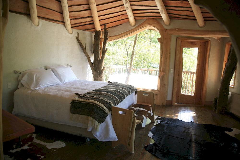 Tree Lodge Nidos De Pucon Bagian luar foto
